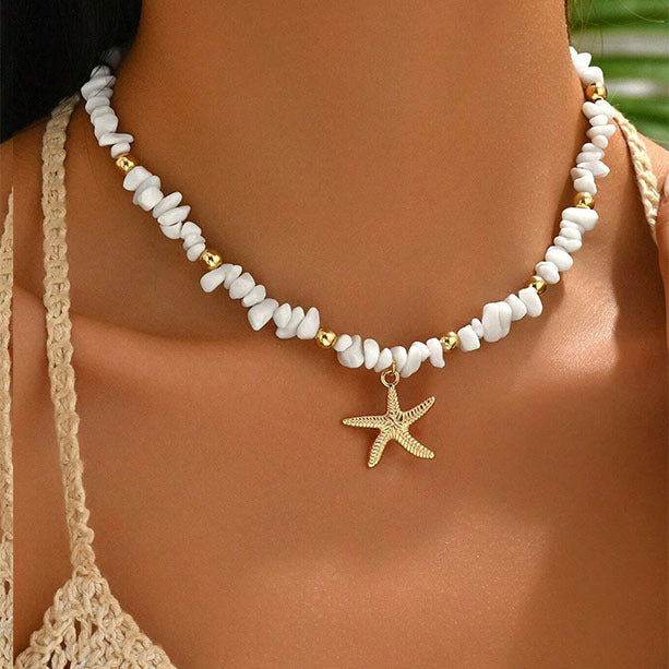 Collana con clavicola in ciottoli irregolari e motivo a stella marina