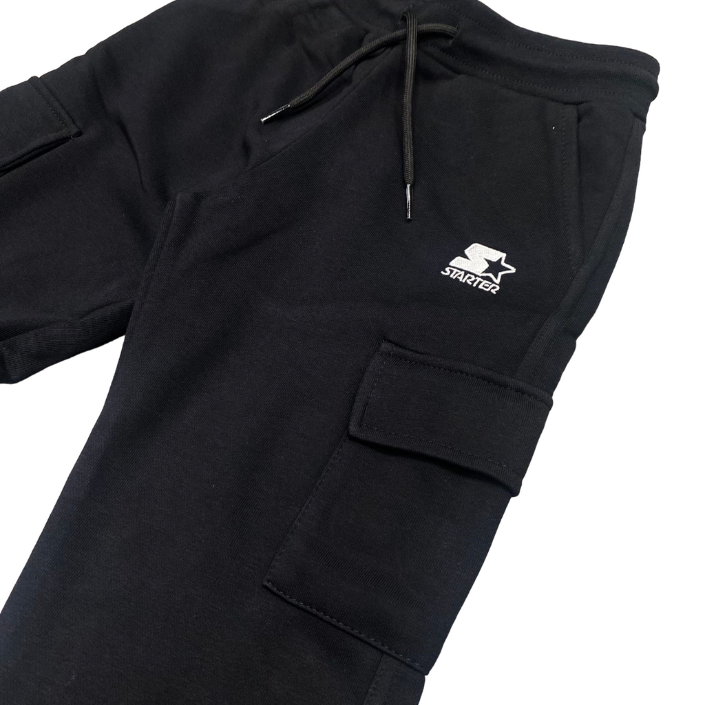 Starter pantalone sportivo con tasconi da ragazzo. Colore nero